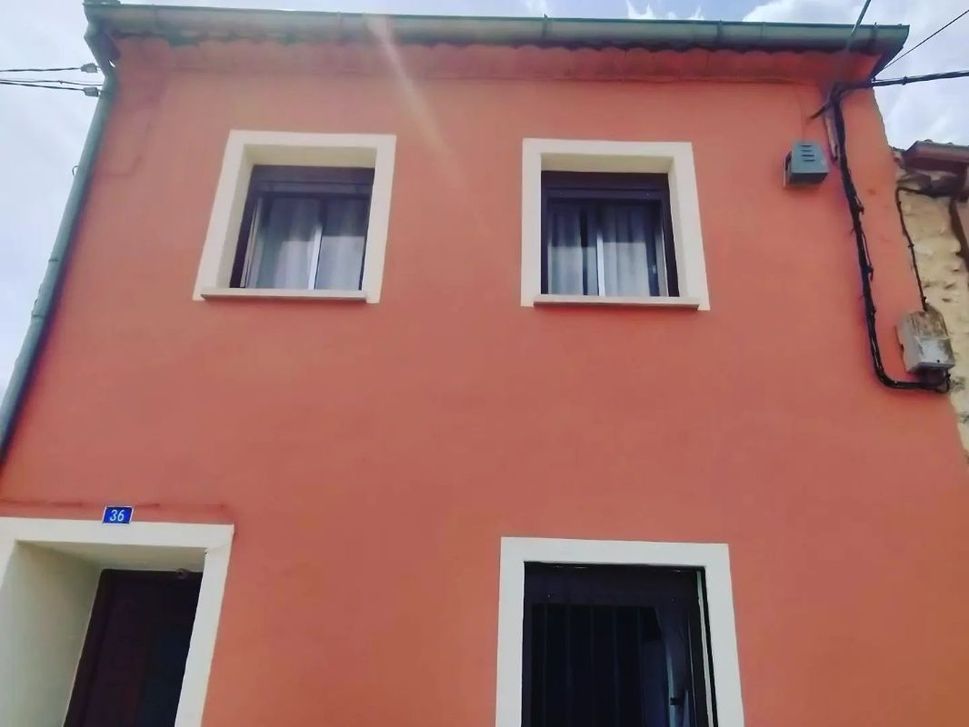 Fachada de vivienda pintada
